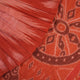 Professional styling view of a rust Sambalpuri cotton saree draped on a model for an elegant ethnic look.