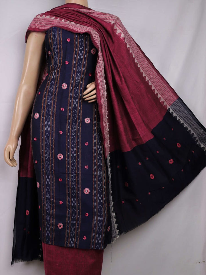 Close-up of blouse piece with blue and magenta motifs in Sambalpuri style