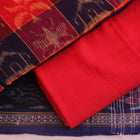 Detail of the red Sambalpuri cotton dress material's blouse piece with motifs.