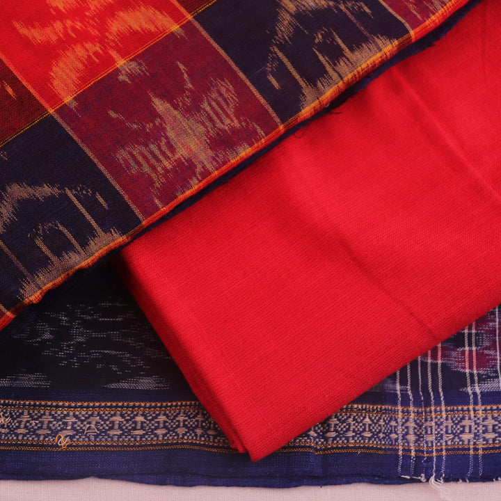 Detail of the red Sambalpuri cotton dress material's blouse piece with motifs.