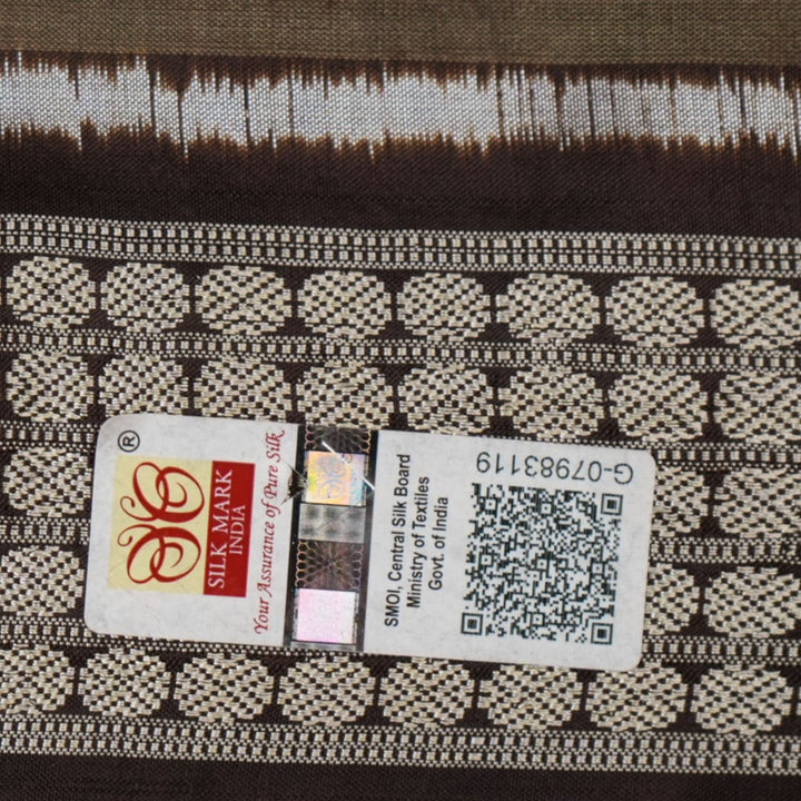 Close-up of the grey and black Sambalpuri Silk Saree fabric, highlighting its rich silk texture and weave.