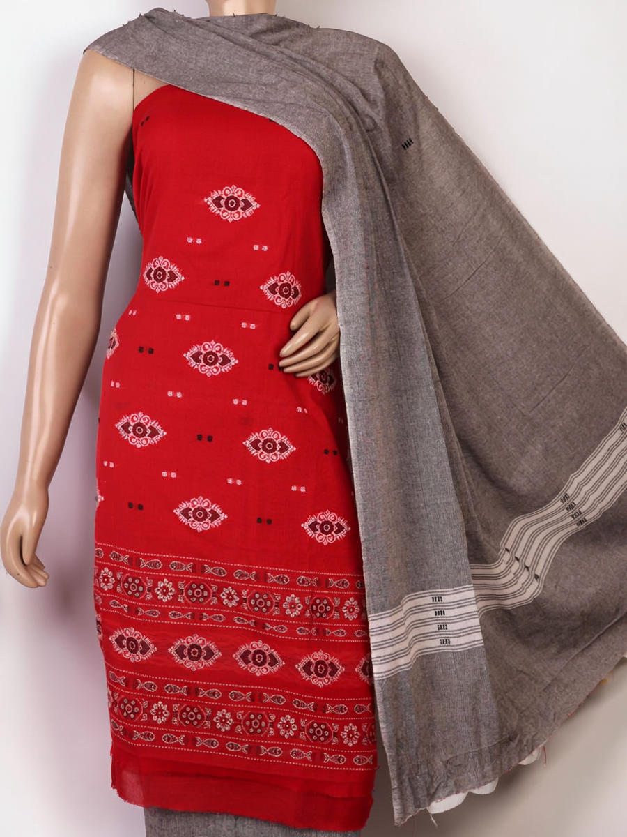 Close-up of the red and grey Bomkai cotton blouse piece with subtle pattern.