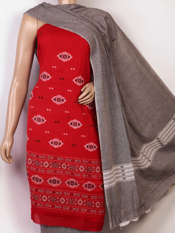 Close-up of the red and grey Bomkai cotton blouse piece with subtle pattern.