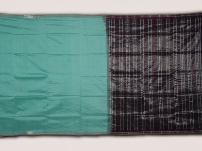 Ultra close-up of the luxurious green Sambalpuri handloom silk weave, highlighting its smooth texture.