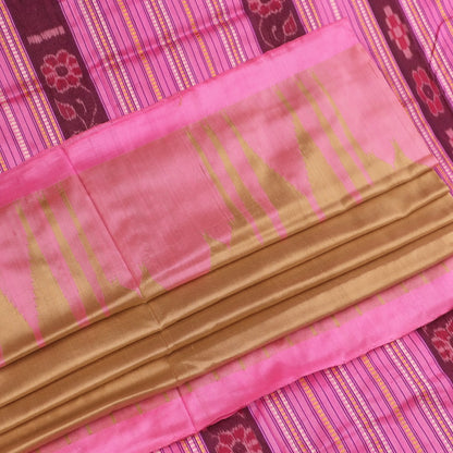 Close-up of green and pink plain Sambalpuri silk saree fabric texture.