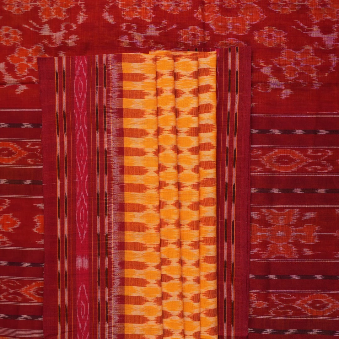 Full styling view of a model draped in a yellow and maroon Sambalpuri cotton saree with motifs.