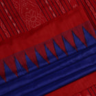 Close-up of the smooth, textured fabric of the blue Tussar silk saree.