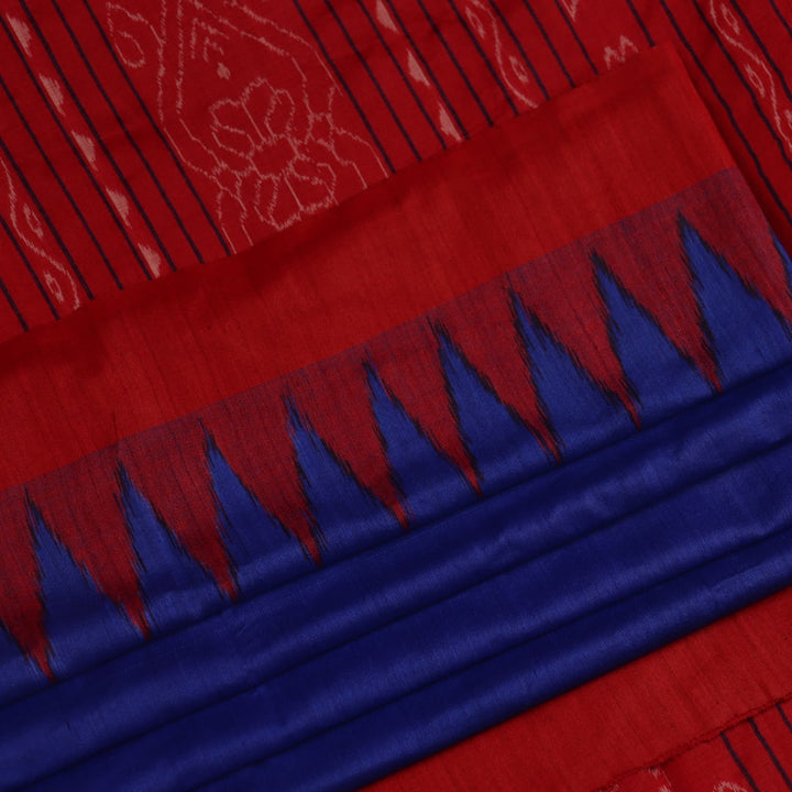 Close-up of the smooth, textured fabric of the blue Tussar silk saree.