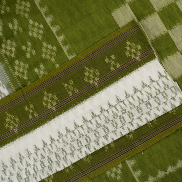 Model wearing a white and green Sambalpuri cotton saree, demonstrating the elegant drape and handloom motifs.