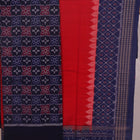 Detail of Sambalpuri blue and red cotton dress material blouse piece, featuring motifs.