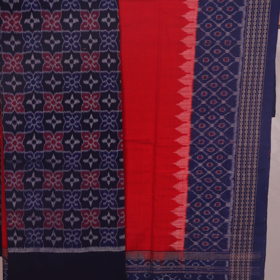 Detail of Sambalpuri blue and red cotton dress material blouse piece, featuring motifs.