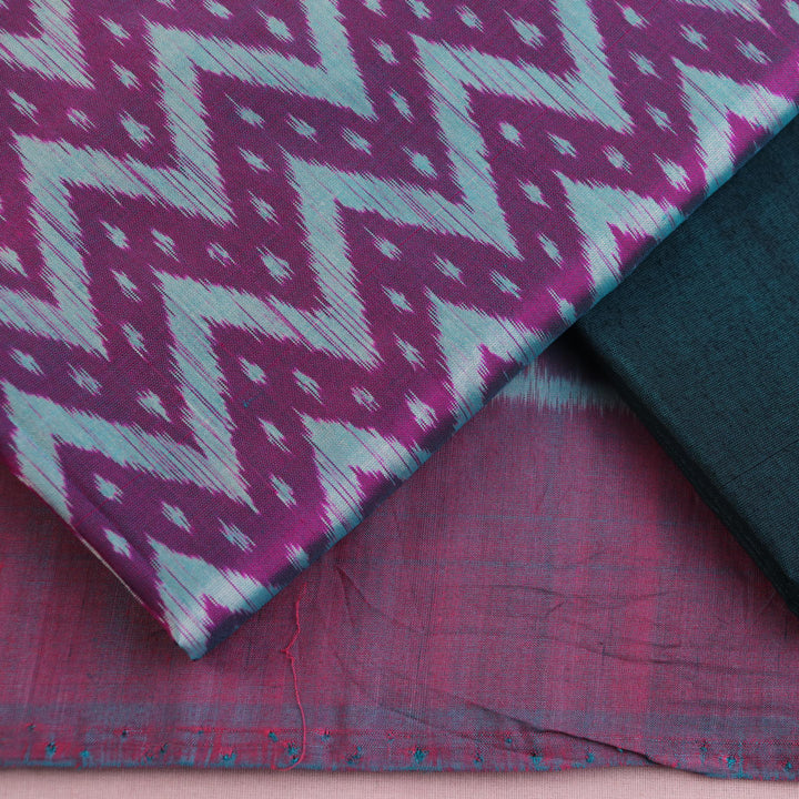 Sambalpuri silk dress material: Purple-green blouse piece with motif details.