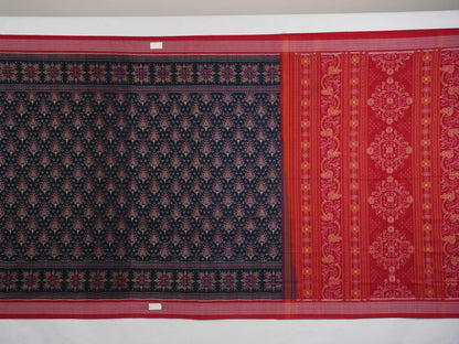 Full flat layout of a black and red Sambalpuri cotton saree showing the complete design, pallu, and border.