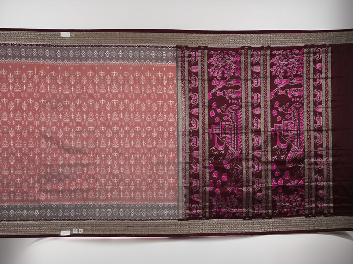 Close-up of the rich multi-color and maroon Sambalpuri silk fabric, highlighting its exquisite handloom weave texture.