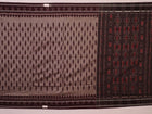 Elegantly draped grey Sambalpuri cotton saree with maroon motifs.