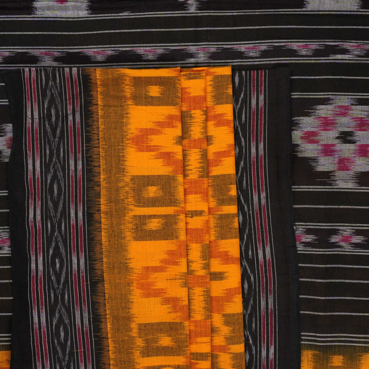 Professional styling of the yellow and black Sambalpuri cotton saree with traditional motifs shown on a model.