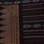 Full display of a handwoven plain grey Sambalpuri cotton saree with black details.