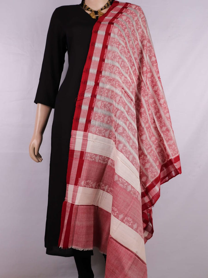 White and red Sambalpuri cotton dupatta with intricate motif patterns, draped over a traditional outfit