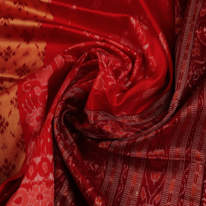 Close-up showcasing the fine texture of the silk material used in the Sambalpuri saree.