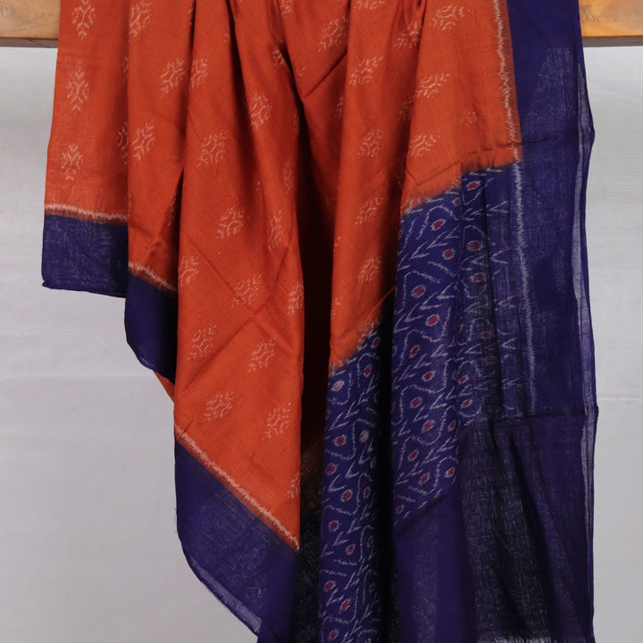 Stylish brown cotton dupatta with blue motifs, draped gracefully on a model