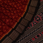 Close-up showing the fine silk texture and intricate motifs of the Sambalpuri saree