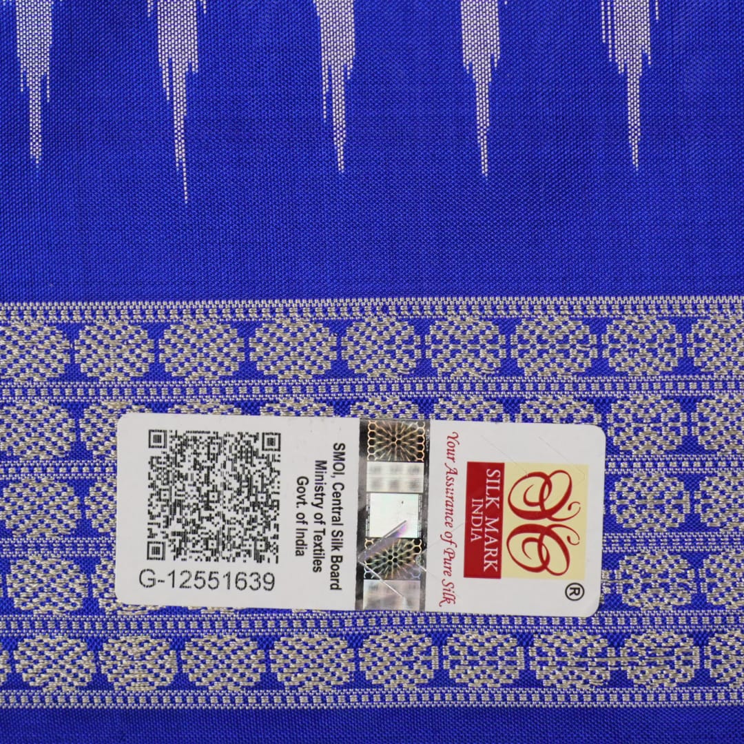 Ultra close-up of Bomkai Silk Saree fabric, highlighting the exquisite grey and blue weave texture.