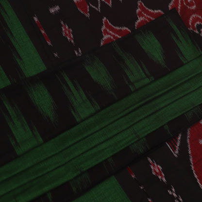 Green and black plain Sambalpuri cotton saree gracefully draped on a model, highlighting its elegant styling.