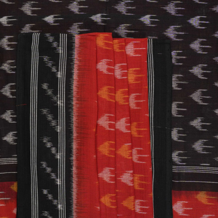 Model wearing a rust and black Sambalpuri cotton saree styled with traditional Odisha handloom motifs.