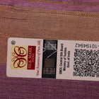 Close-up view of the textured Tussar silk fabric of the saree