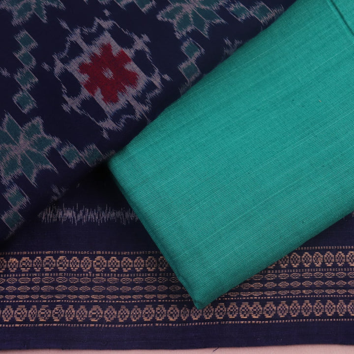 Detail of a Sambalpuri cotton dress material's blouse piece, featuring blue and green motifs.