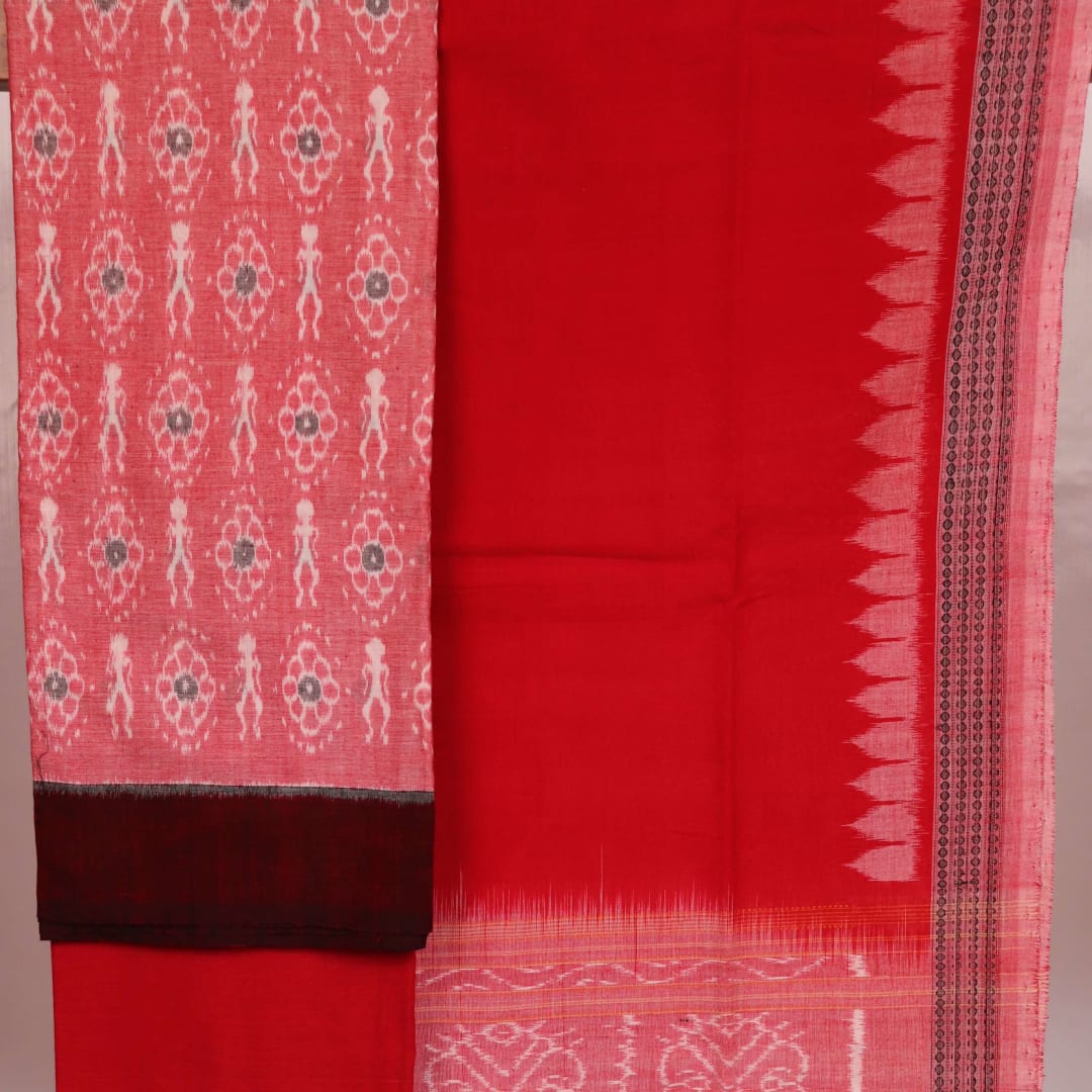 Close-up of red and pink cotton Sambalpuri dress material with intricate motifs.