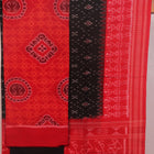 Blouse piece of red and black Sambalpuri cotton dress material with motifs.