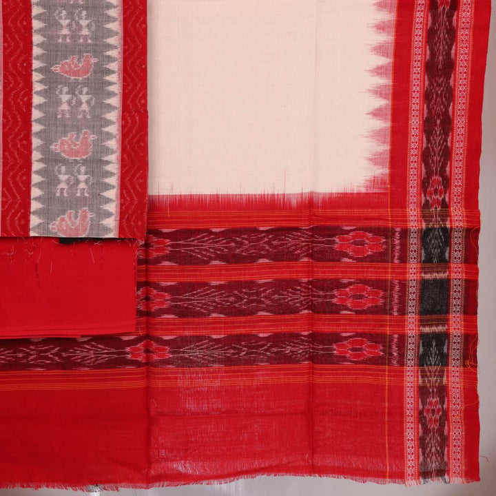 Close-up view of blouse piece with Sambalpuri motifs in grey and red cotton