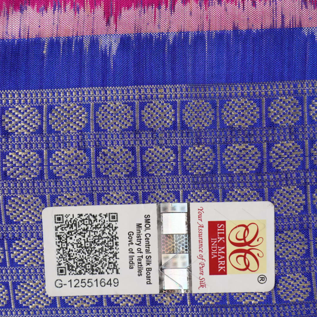 Close-up showing the luxurious handloom silk fabric texture and fine weave of the pink Sambalpuri saree.