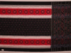 Saree styling: A red and black Sambalpuri cotton handloom saree with motifs is beautifully draped.
