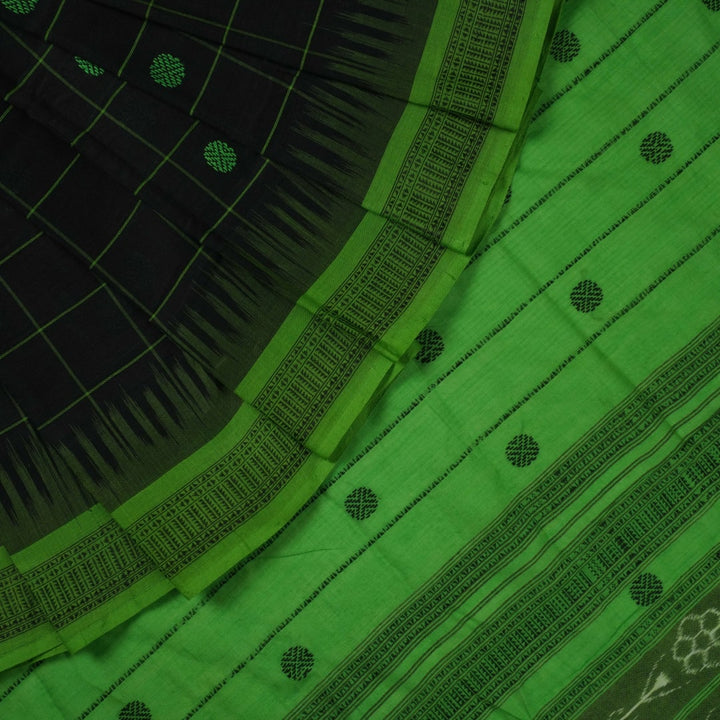 Full flat layout of a black Sambalpuri cotton saree with green butta patterns and an intricate ikat border.