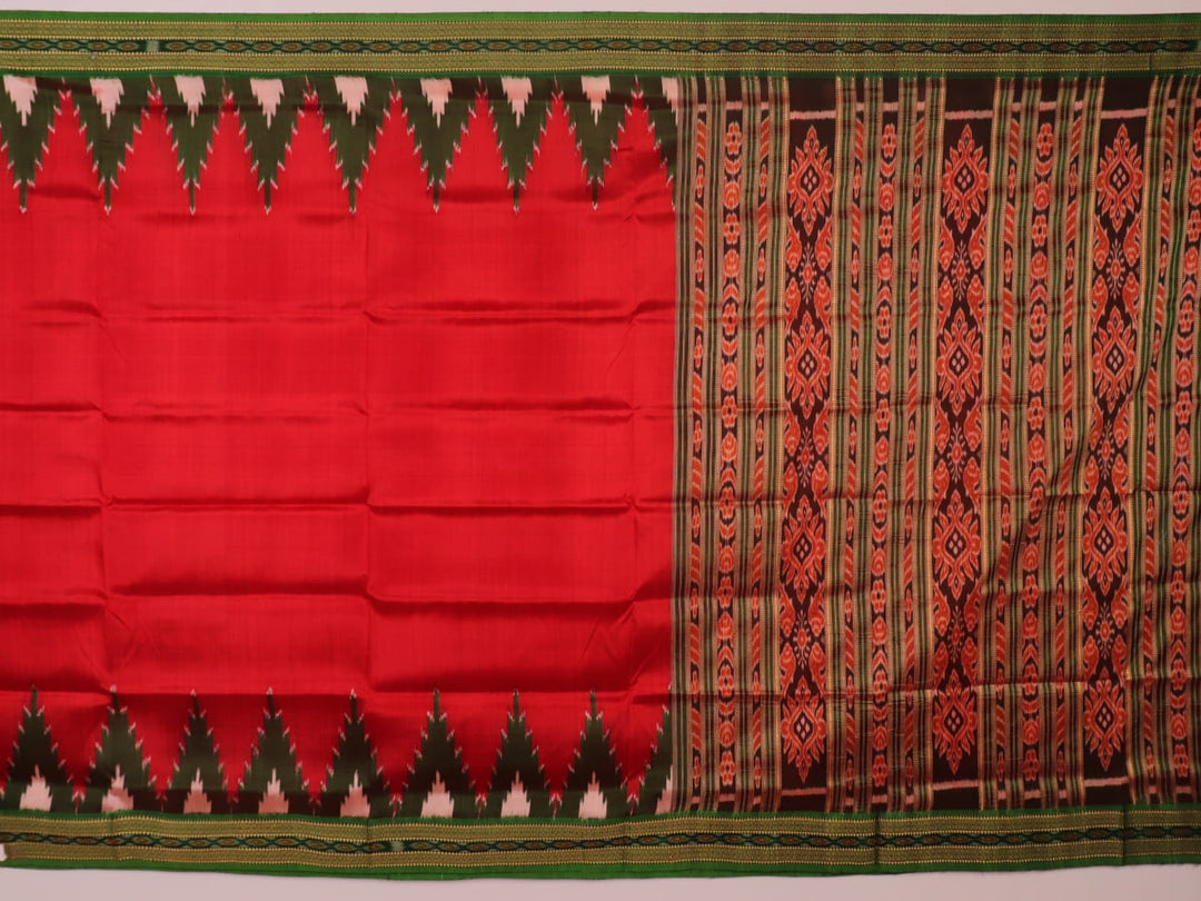 Red and green Khandua silk saree draped, showcasing the overall look and fall.
