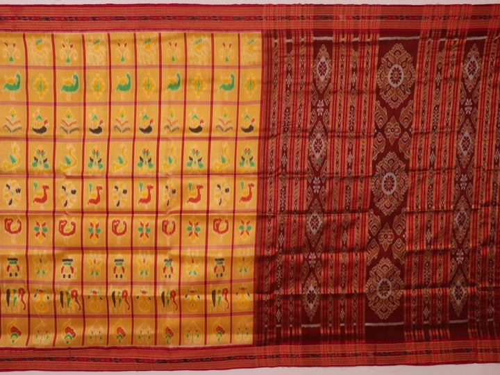 Saree draped to showcase the Nabakothi pattern, red border, and multi-colored silk Khandua handloom artistry.