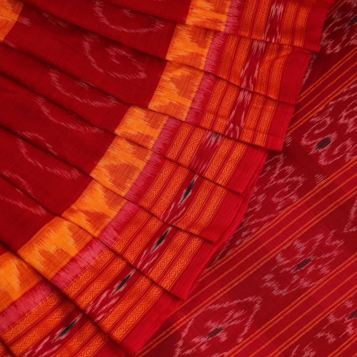 Styling view of yellow and red cotton Sambalpuri saree with motifs