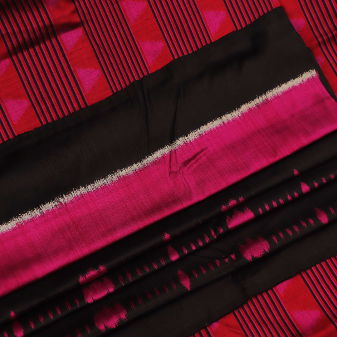 Full view of an intricately patterned black silk Khandua saree with black motifs