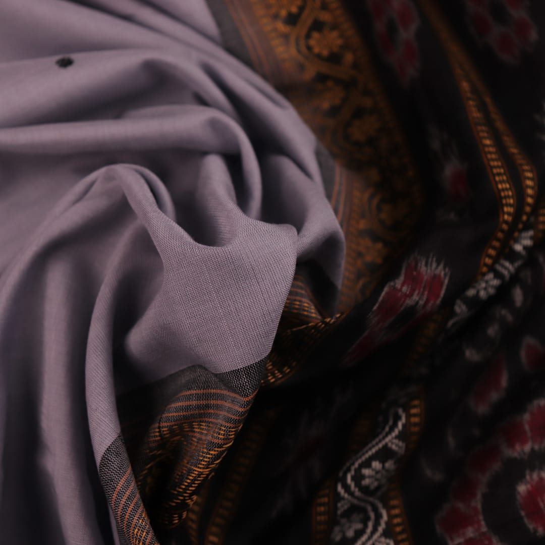 Full view of a grey cotton Sambalpuri saree with black butta pattern