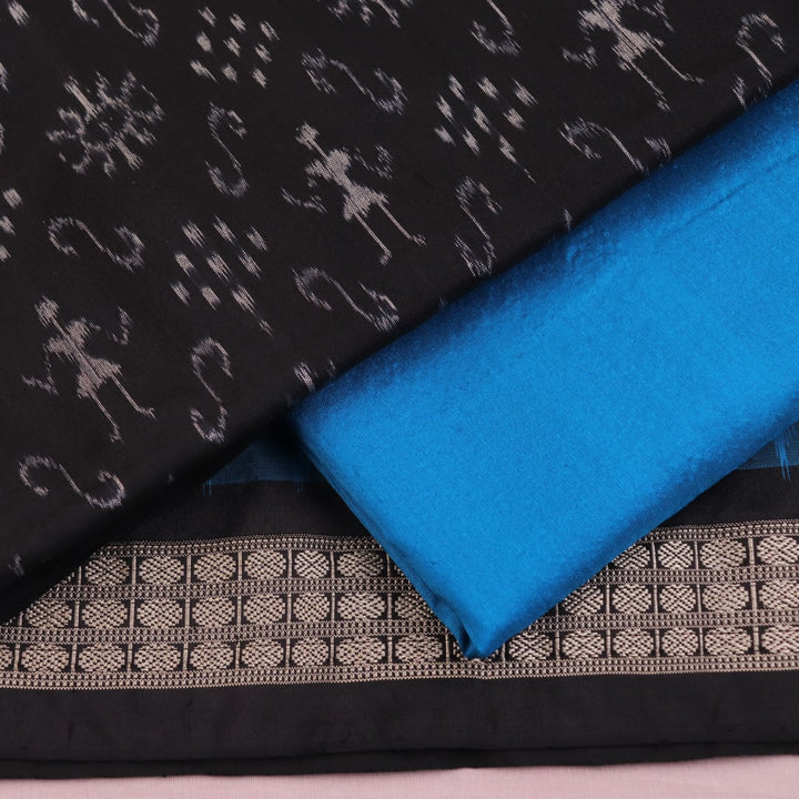 Detail of Sambalpuri black and blue silk dress material blouse piece with motifs.