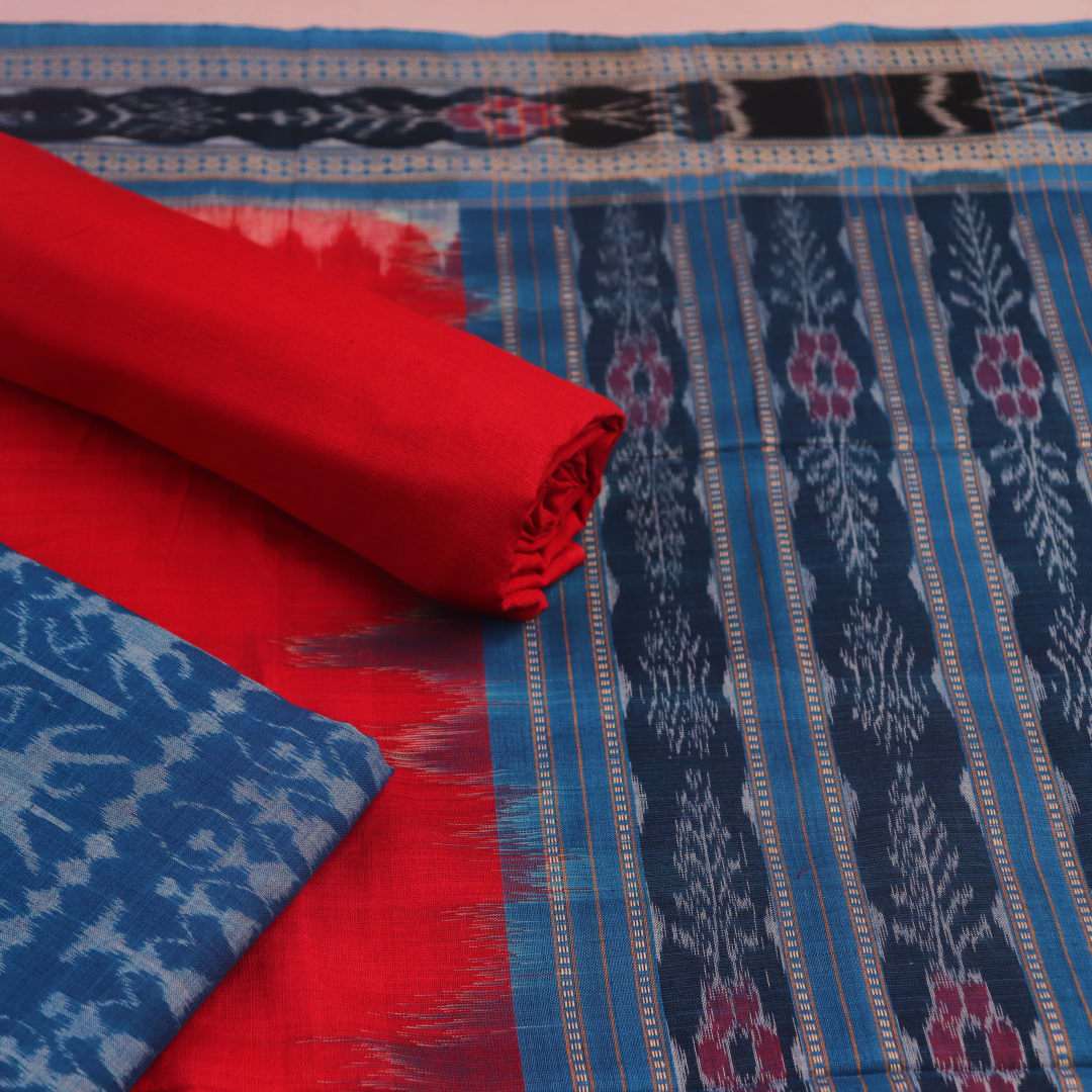 Close-up of the blue and red Sambalpuri cotton dress material's blouse piece with motifs.