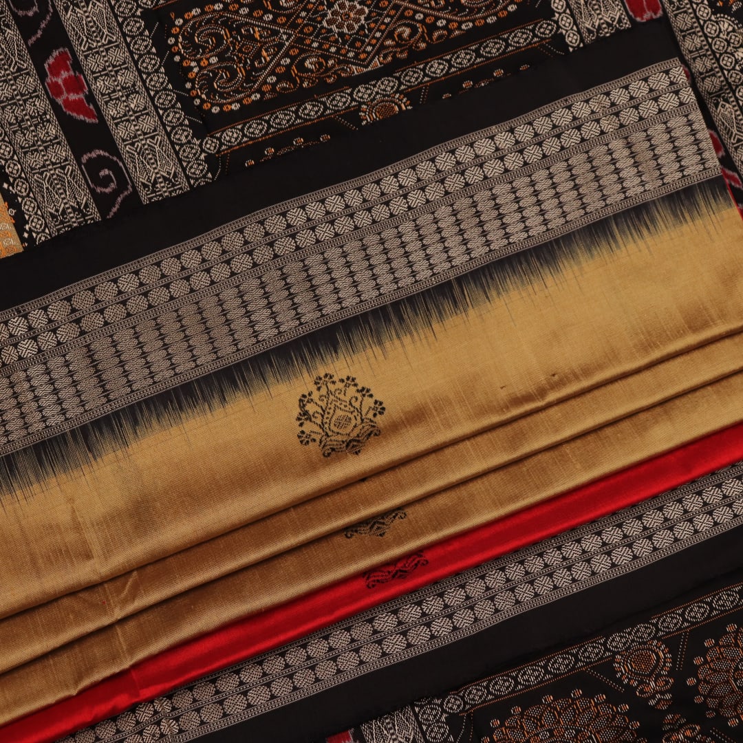 Close-up view of the vibrant and intricate silk fabric texture of a multicolored Bomkai silk saree with a black butta pattern.