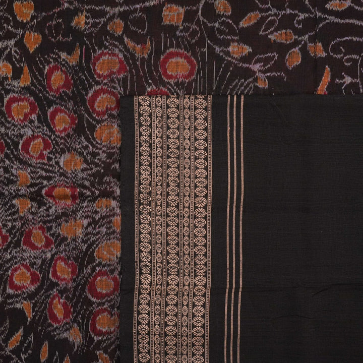 Full layout view of a rust and black Sambalpuri cotton saree displaying the complete body pattern and motifs.