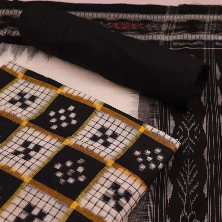 Close-up view of a black and white Sambalpuri cotton blouse piece with a Pasapalli pattern.