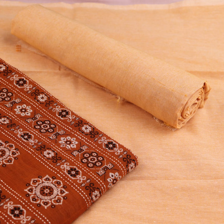 Matching blouse piece detail for the rust and cream Bomkai Cotton Dress Material, showcasing complementary weave.