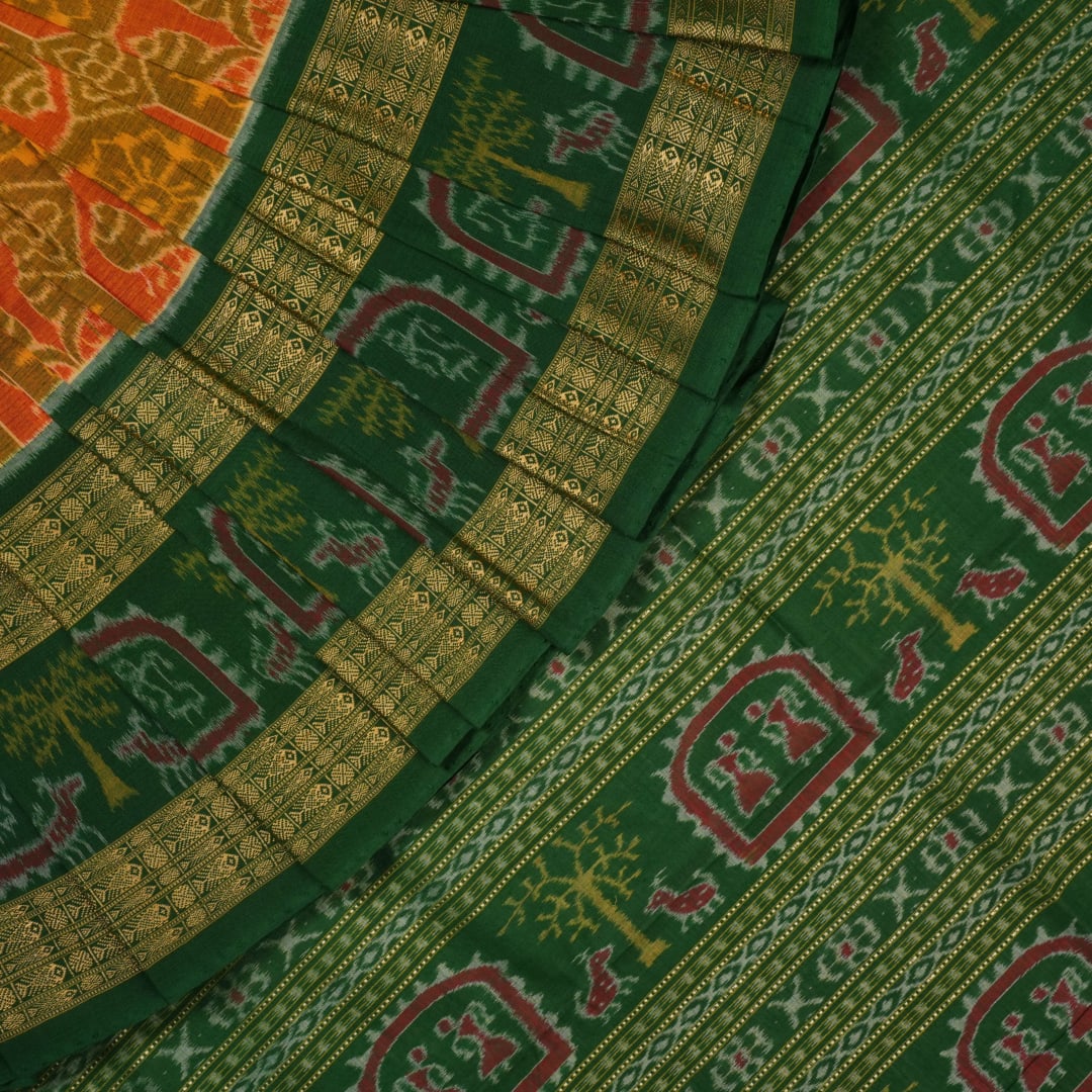 Full flat layout of the green Sambalpuri cotton saree displaying the complete body and pallu motifs