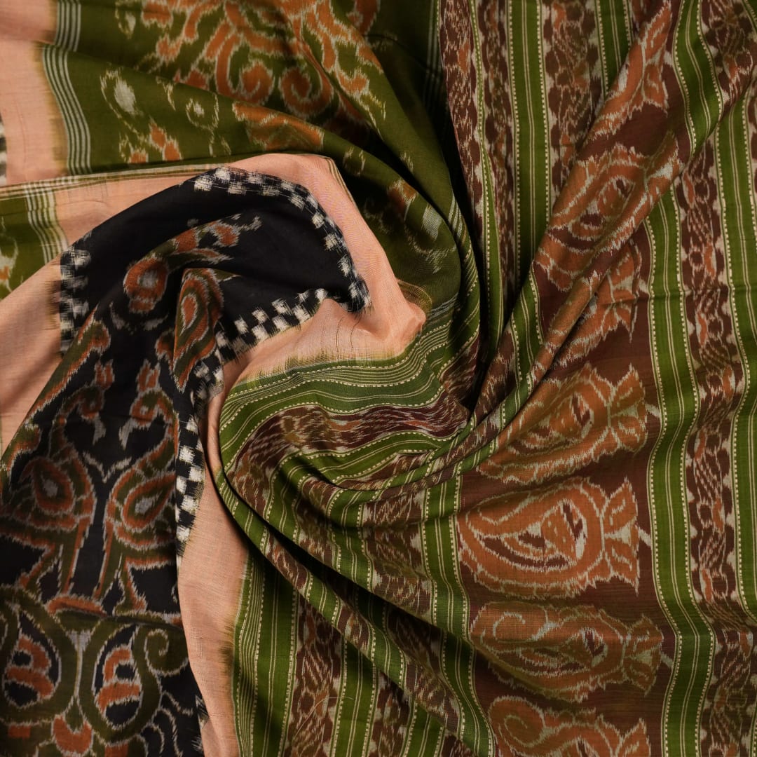 Model draped in a green Pasapalli Sambalpuri cotton saree, showcasing traditional Odisha handloom style.