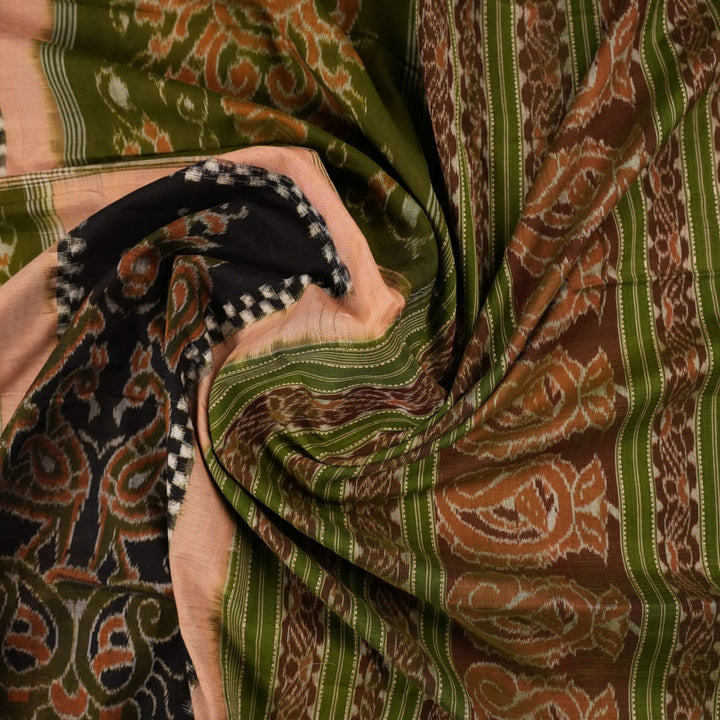 Model draped in a green Pasapalli Sambalpuri cotton saree, showcasing traditional Odisha handloom style.